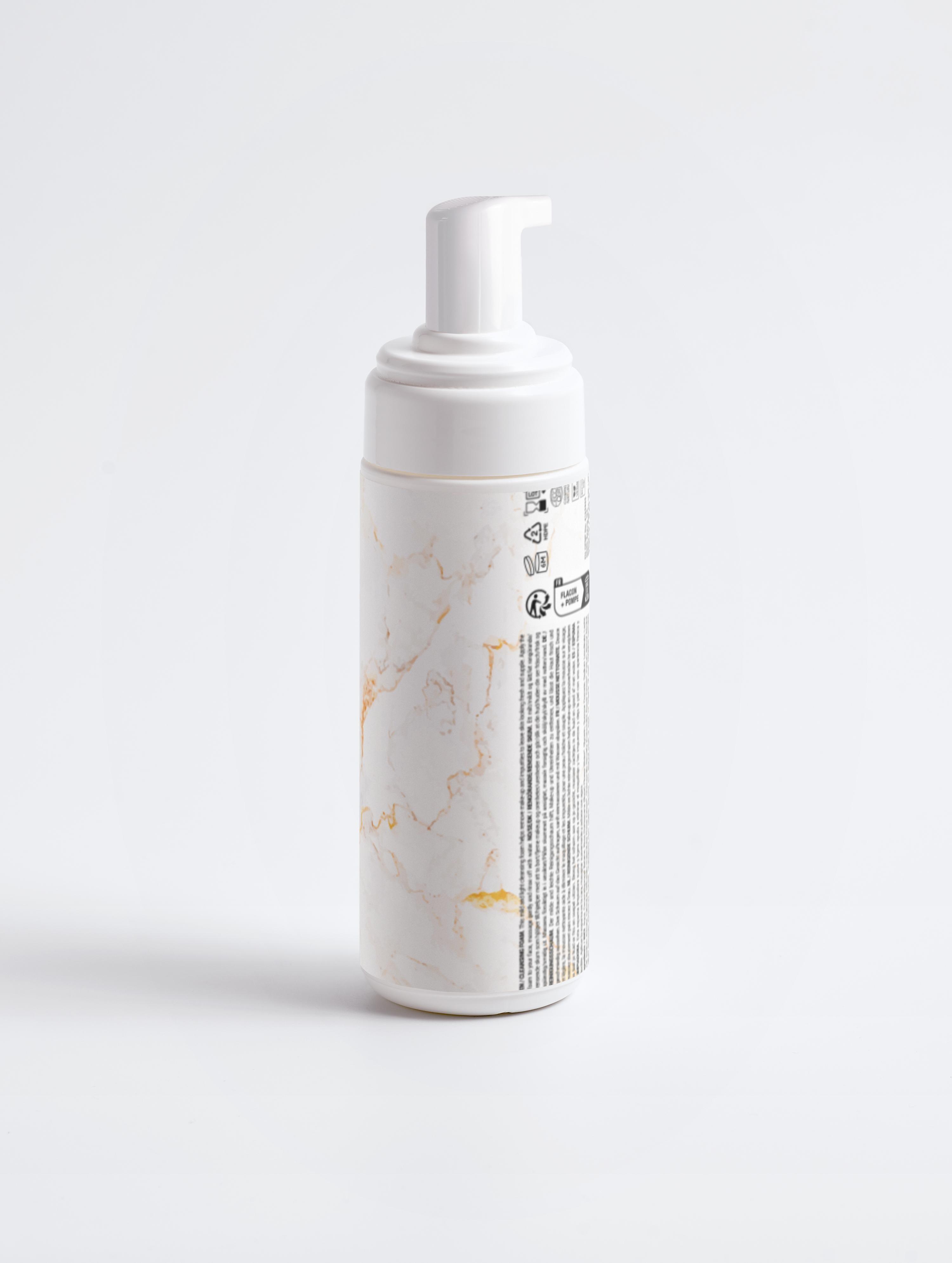 Eclat Soin Gentle Cleansing Foam in a stylish marble-patterned bottle for daily skincare